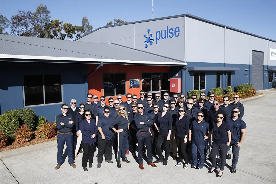 Team Pulse infront of HQ